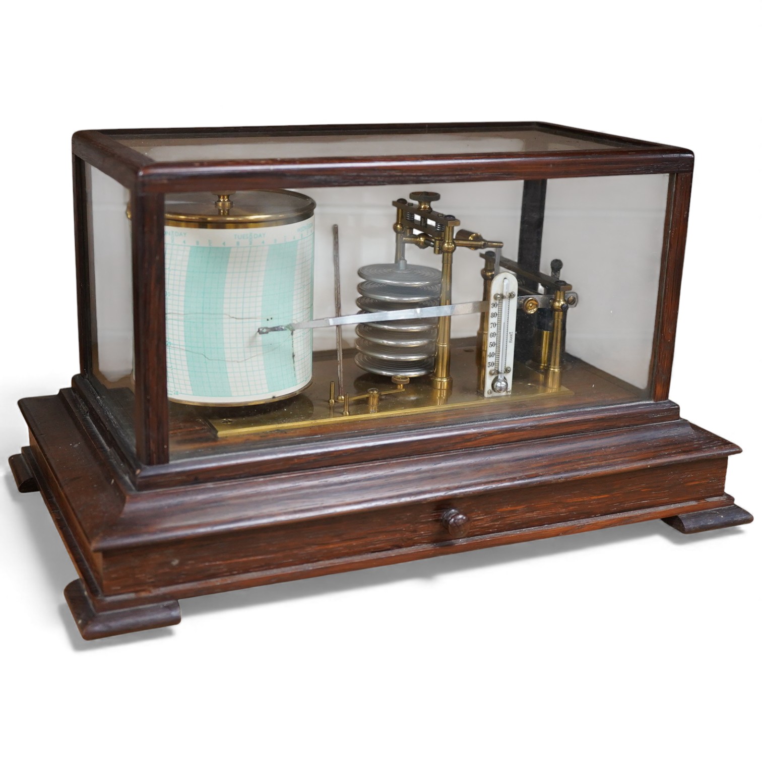 An early 20th century oak cased barograph, without maker’s mark, however stamped 418 into the case and with an unusual hinged lid, ivory backed thermometer and integral drawer beneath containing two boxed Negretti & Zamb